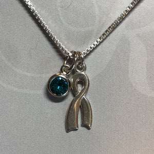 Sterling silver awareness ribbon pendant on sterling silver box chain necklace with Swarovski crystal