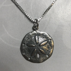 Sterling silver sand dollar pendant on sterling silver box chain necklace